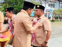 Aprinaldi Terima Lencana Darma Bakti